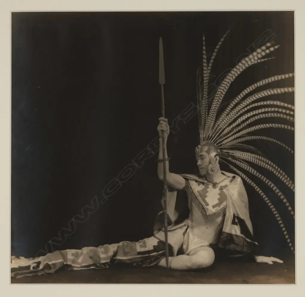 Unidentified photographer 'Male dancer in 'Aztec' costume with spear', c.1930 Image 1++